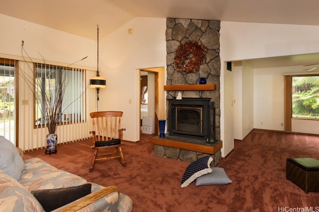 carpeted living room with lofted ceiling and a fireplace