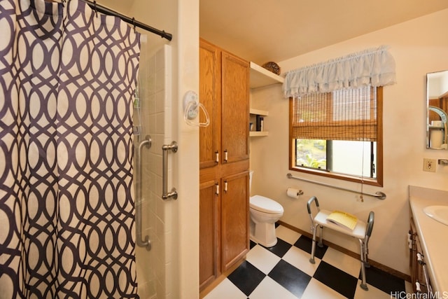 bathroom with vanity, toilet, and a shower with shower curtain