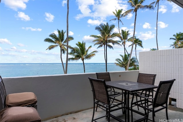 view of patio with a water view