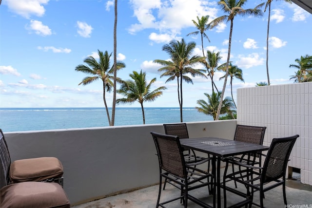 53-567 Kamehameha Hwy Unit 311, Hauula, HI 96717 - view of patio / terrace featuring a water view and outdoor dining space