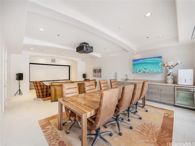 cinema room featuring wine cooler, bar, and beamed ceiling