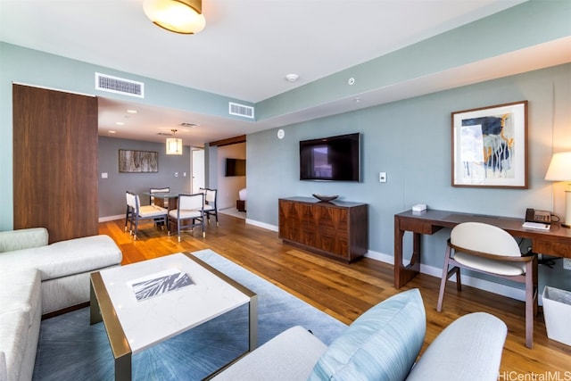 living room with hardwood / wood-style flooring