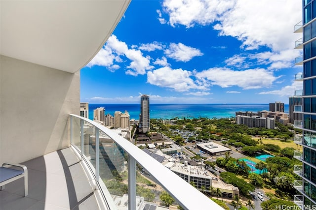 balcony featuring a water view