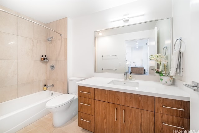 full bathroom featuring vanity, tiled shower / bath combo, toilet, and tile patterned flooring