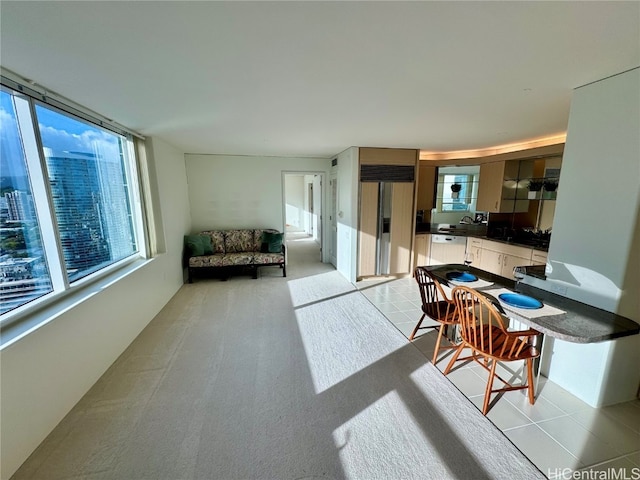 interior space featuring sink and light tile patterned floors