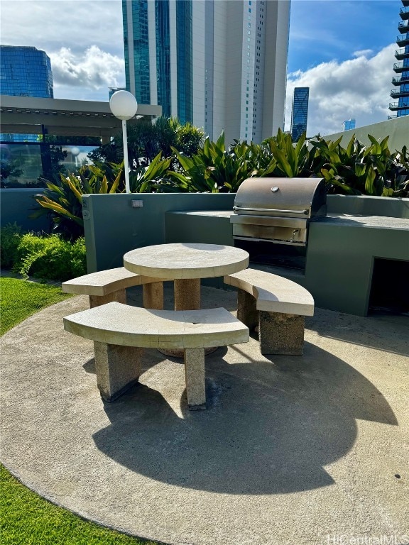 view of patio with exterior kitchen