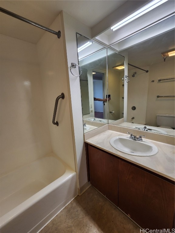 full bathroom with toilet, vanity, and shower / bathtub combination