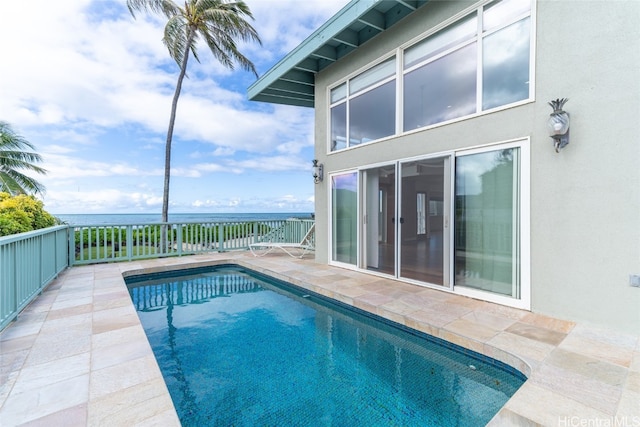 view of pool featuring a patio area