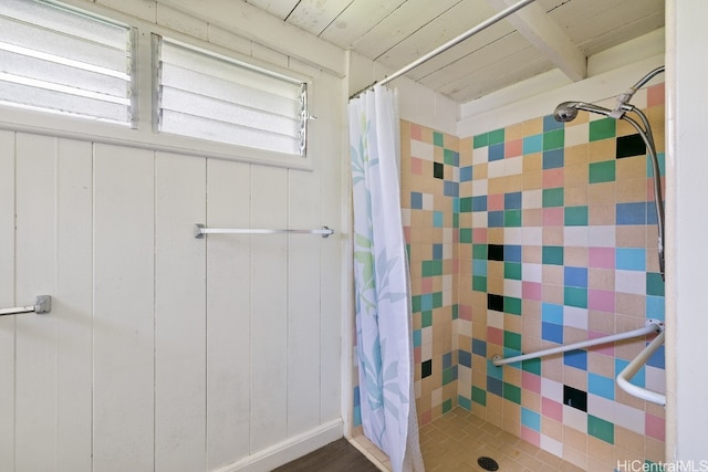 bathroom featuring wood ceiling, hardwood / wood-style floors, curtained shower, and wood walls