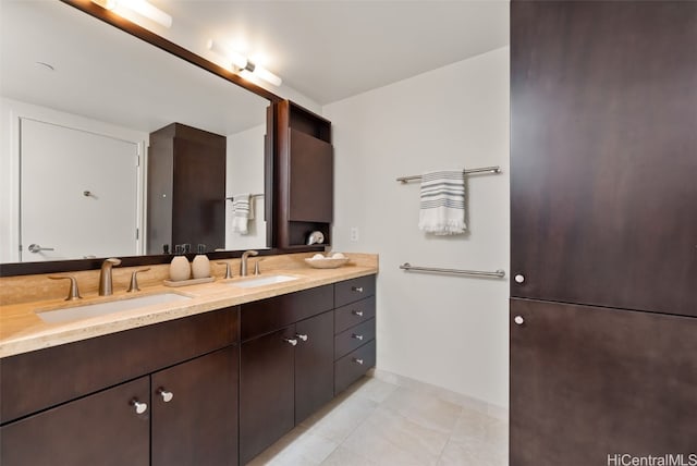 bathroom with vanity and tile patterned floors