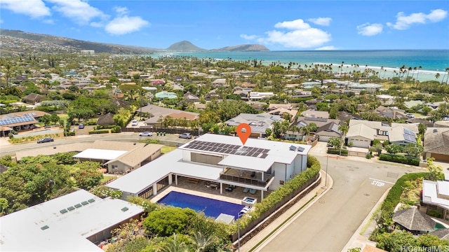 bird's eye view with a water and mountain view