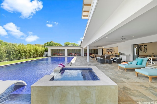 view of swimming pool featuring a patio, an outdoor living space, a jacuzzi, and ceiling fan