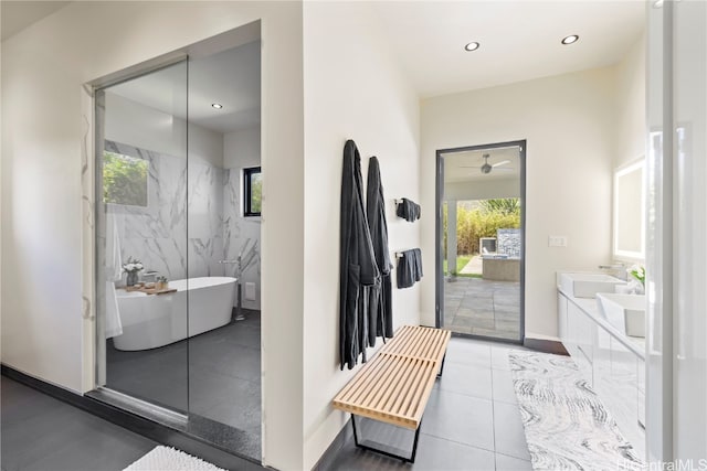 bathroom with vanity, separate shower and tub, and tile patterned flooring