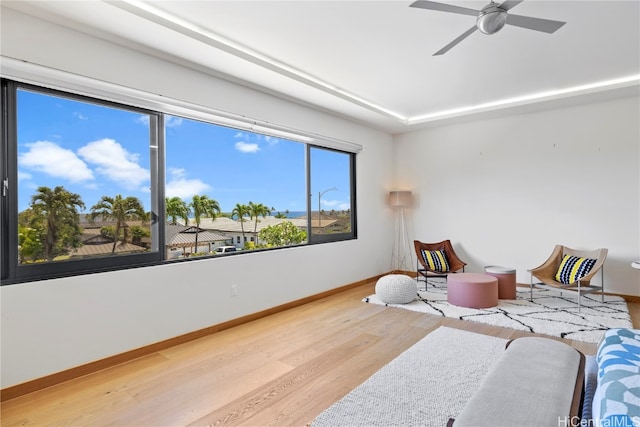 bedroom with wood-type flooring and ceiling fan