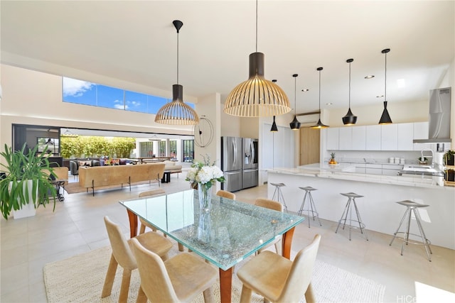 dining area with light tile patterned floors