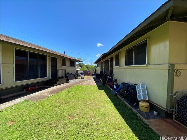 view of yard featuring central AC