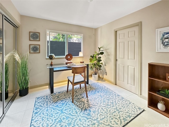 office area with light tile patterned floors