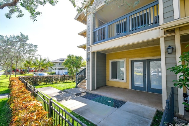 view of patio with a balcony