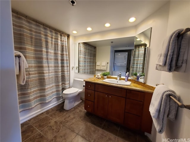 full bathroom with vanity, toilet, tile patterned floors, and shower / tub combo