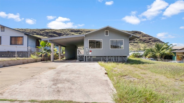 view of front of house with a carport