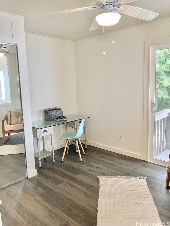 home office featuring ceiling fan, crown molding, and dark hardwood / wood-style floors