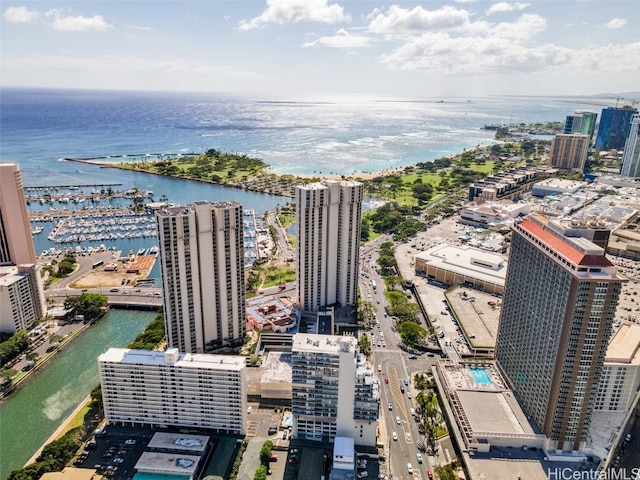 birds eye view of property featuring a water view