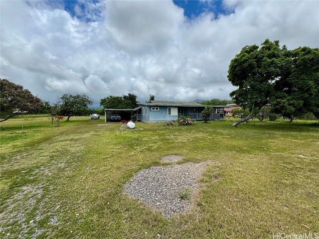 view of yard featuring a carport