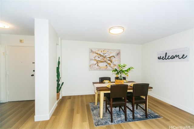 dining room featuring hardwood / wood-style flooring