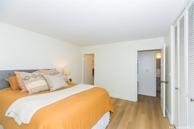 bedroom featuring light hardwood / wood-style floors