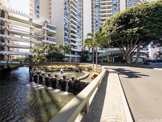 view of home's community featuring a water view