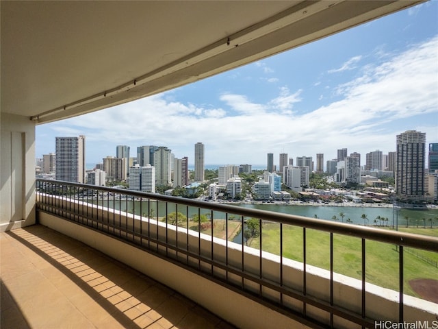 balcony featuring a water view