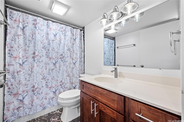 bathroom with toilet, curtained shower, marble finish floor, and vanity