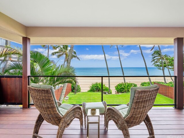 sunroom with a water view