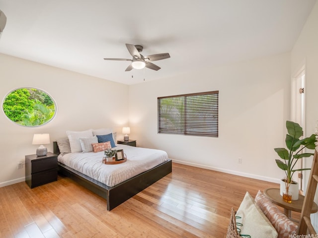 59-355 Ke Nui Rd, Haleiwa, HI 96712 - bedroom with baseboards, hardwood / wood-style floors, and a ceiling fan