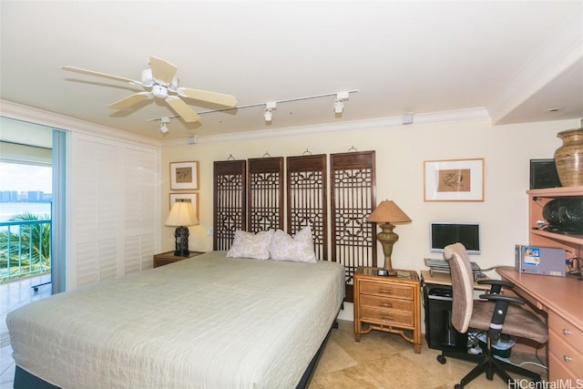 bedroom featuring ceiling fan, rail lighting, and ornamental molding