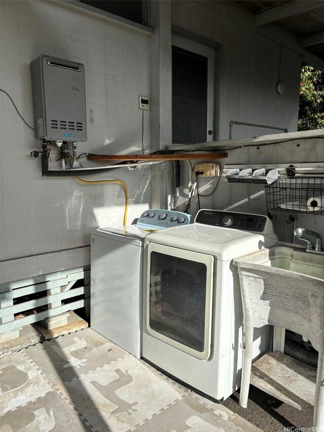 1629 Kino St Unit F, Honolulu, HI 96819 - laundry room featuring independent washer and dryer and tankless water heater