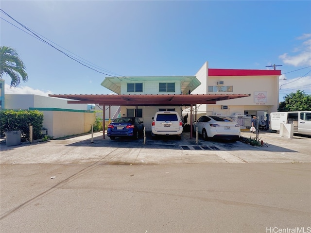 view of front of home featuring a carport