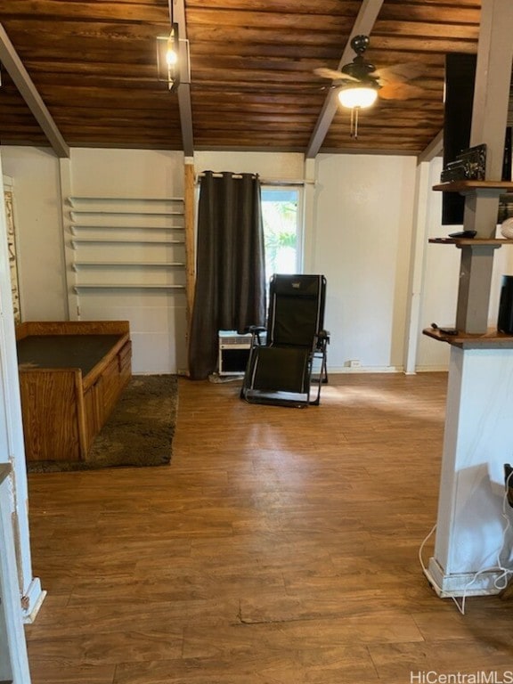 sitting room with hardwood / wood-style floors, lofted ceiling with beams, wood ceiling, and ceiling fan