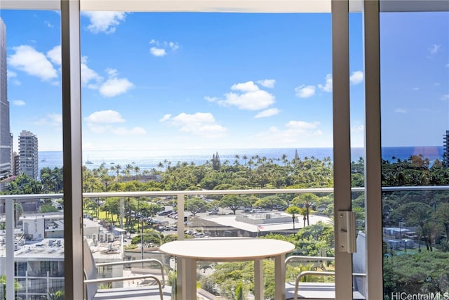 balcony featuring a water view