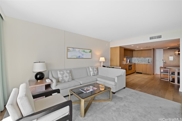 living room with light wood-type flooring