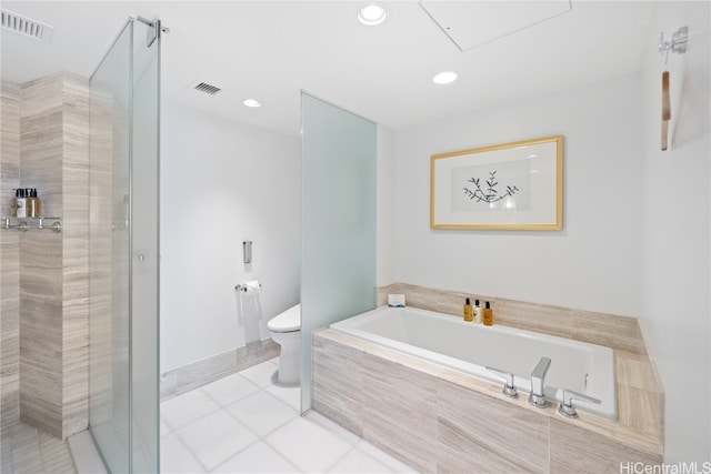 bathroom featuring toilet, shower with separate bathtub, and tile patterned floors