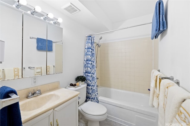 full bathroom featuring vanity, toilet, and shower / tub combo with curtain