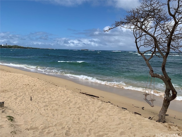 view of water feature featuring a view of the beach