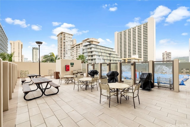 view of patio with a grill