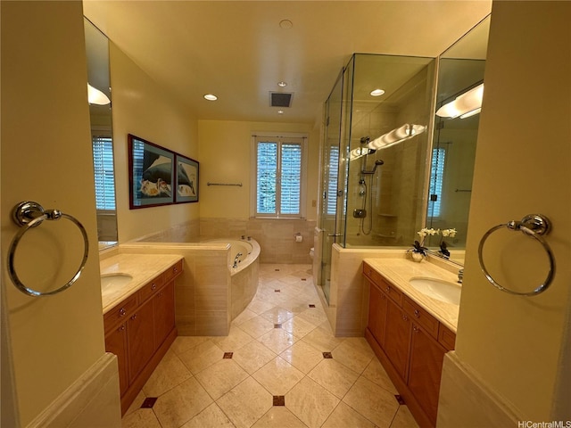 1740 S Beretania St Unit 33, Honolulu, HI 96826 - bathroom with tile patterned flooring, a stall shower, two vanities, a bath, and tile walls