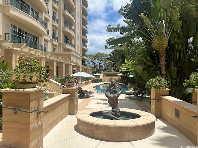 1740 S Beretania St Unit 33, Honolulu, HI 96826 - view of patio with a community pool