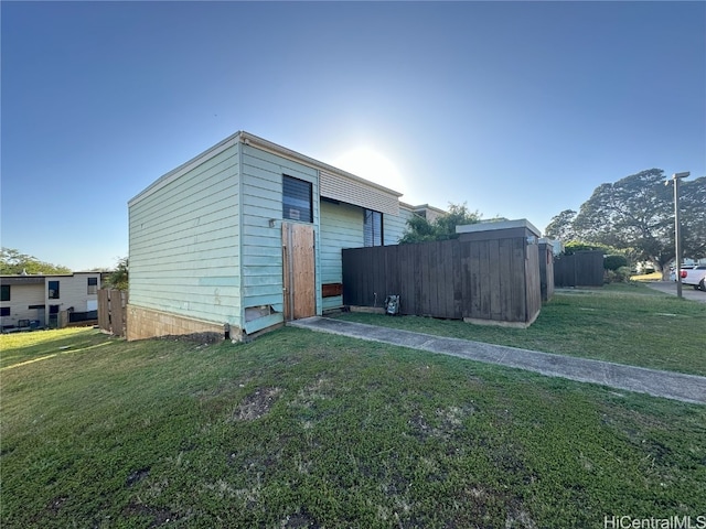 exterior space featuring a yard