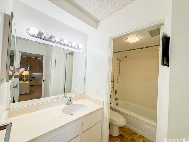 full bathroom with toilet, a textured ceiling, tub / shower combination, and vanity