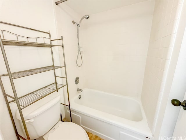 bathroom with toilet and shower / bathtub combination