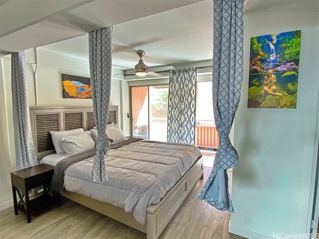 bedroom with light hardwood / wood-style flooring and ceiling fan